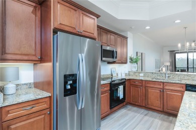 ***NOTE: the sliding door to the balcony is off the living room on Legacy Golf Club in Florida - for sale on GolfHomes.com, golf home, golf lot