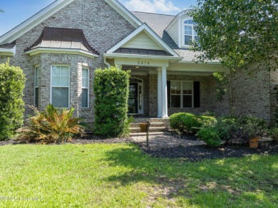 Discover refined Southern living in this meticulously crafted 2 on Members Club At St. James Plantation in North Carolina - for sale on GolfHomes.com, golf home, golf lot