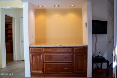 Furnished one level condo with attached garage on the golf on London Bridge Golf Course in Arizona - for sale on GolfHomes.com, golf home, golf lot