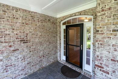 Discover refined Southern living in this meticulously crafted 2 on Members Club At St. James Plantation in North Carolina - for sale on GolfHomes.com, golf home, golf lot