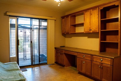 Furnished one level condo with attached garage on the golf on London Bridge Golf Course in Arizona - for sale on GolfHomes.com, golf home, golf lot