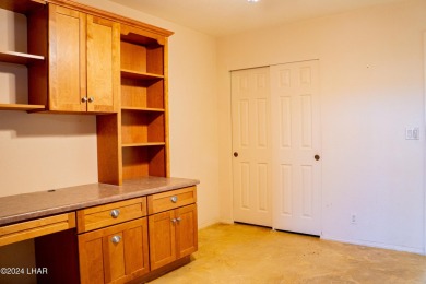 Furnished one level condo with attached garage on the golf on London Bridge Golf Course in Arizona - for sale on GolfHomes.com, golf home, golf lot