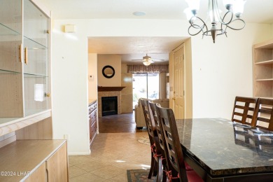 Furnished one level condo with attached garage on the golf on London Bridge Golf Course in Arizona - for sale on GolfHomes.com, golf home, golf lot