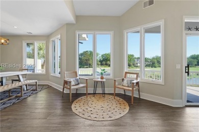 GORGEOUS lagoon to golf views from this renovated Fairway Winds on Port Royal Golf and Racquet Club in South Carolina - for sale on GolfHomes.com, golf home, golf lot
