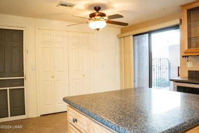 Furnished one level condo with attached garage on the golf on London Bridge Golf Course in Arizona - for sale on GolfHomes.com, golf home, golf lot