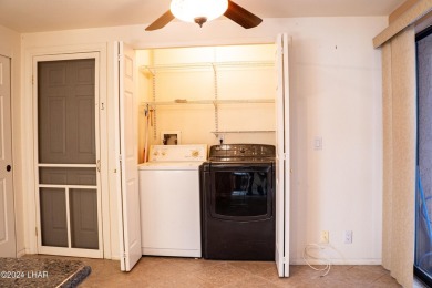 Furnished one level condo with attached garage on the golf on London Bridge Golf Course in Arizona - for sale on GolfHomes.com, golf home, golf lot