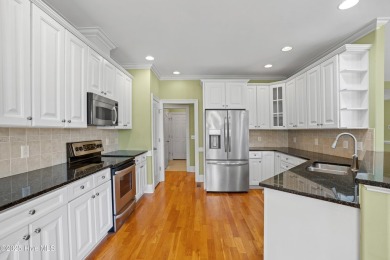 Discover refined Southern living in this meticulously crafted 2 on Members Club At St. James Plantation in North Carolina - for sale on GolfHomes.com, golf home, golf lot