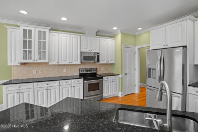 Discover refined Southern living in this meticulously crafted 2 on Members Club At St. James Plantation in North Carolina - for sale on GolfHomes.com, golf home, golf lot