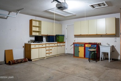 Furnished one level condo with attached garage on the golf on London Bridge Golf Course in Arizona - for sale on GolfHomes.com, golf home, golf lot