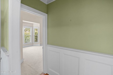 Discover refined Southern living in this meticulously crafted 2 on Members Club At St. James Plantation in North Carolina - for sale on GolfHomes.com, golf home, golf lot