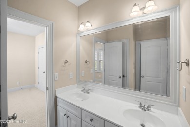 Discover refined Southern living in this meticulously crafted 2 on Members Club At St. James Plantation in North Carolina - for sale on GolfHomes.com, golf home, golf lot