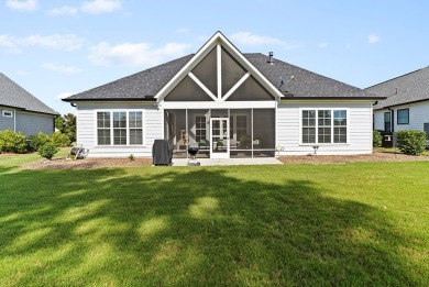 Welcome to 704 Swing About, a like-new custom home built in 2022 on The Links At Stoney Point in South Carolina - for sale on GolfHomes.com, golf home, golf lot