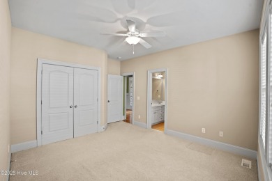 Discover refined Southern living in this meticulously crafted 2 on Members Club At St. James Plantation in North Carolina - for sale on GolfHomes.com, golf home, golf lot