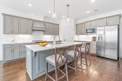 Welcome to 704 Swing About, a like-new custom home built in 2022 on The Links At Stoney Point in South Carolina - for sale on GolfHomes.com, golf home, golf lot