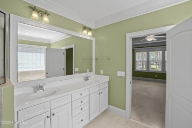 Discover refined Southern living in this meticulously crafted 2 on Members Club At St. James Plantation in North Carolina - for sale on GolfHomes.com, golf home, golf lot