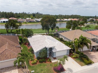 Stunning Rivera model home with fabulous lake and golf course on Herons Glen Golf and Country Club in Florida - for sale on GolfHomes.com, golf home, golf lot