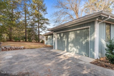 This charming ranch-style home in the gated Carolina Trace on Carolina Trace Country Club in North Carolina - for sale on GolfHomes.com, golf home, golf lot