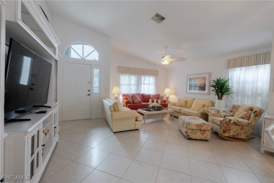 Stunning Rivera model home with fabulous lake and golf course on Herons Glen Golf and Country Club in Florida - for sale on GolfHomes.com, golf home, golf lot