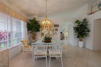 Stunning Rivera model home with fabulous lake and golf course on Herons Glen Golf and Country Club in Florida - for sale on GolfHomes.com, golf home, golf lot