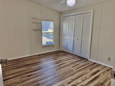 Move-in ready and beautifully refreshed, this 2-bedroom, 2-bath on Zellwood Station Country Club in Florida - for sale on GolfHomes.com, golf home, golf lot