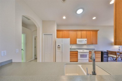 TERRIFIC WATER & GOLF COURSE VIEWS!  Welcome to active & fun on Sandpiper Golf Club in Florida - for sale on GolfHomes.com, golf home, golf lot