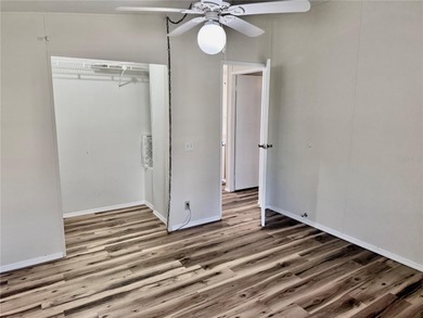 Move-in ready and beautifully refreshed, this 2-bedroom, 2-bath on Zellwood Station Country Club in Florida - for sale on GolfHomes.com, golf home, golf lot