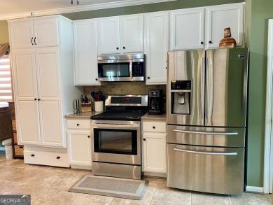 Welcome to 2156 Racoon Court, located in Mirror Lake, a 36 holes on Mirror Lake Golf Club in Georgia - for sale on GolfHomes.com, golf home, golf lot