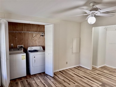 Move-in ready and beautifully refreshed, this 2-bedroom, 2-bath on Zellwood Station Country Club in Florida - for sale on GolfHomes.com, golf home, golf lot