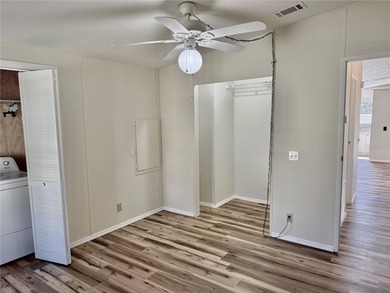 Move-in ready and beautifully refreshed, this 2-bedroom, 2-bath on Zellwood Station Country Club in Florida - for sale on GolfHomes.com, golf home, golf lot