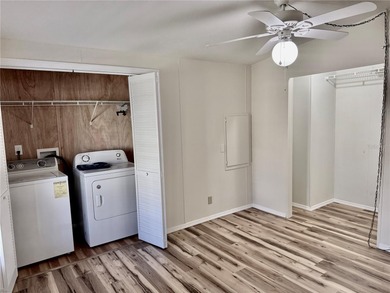 Move-in ready and beautifully refreshed, this 2-bedroom, 2-bath on Zellwood Station Country Club in Florida - for sale on GolfHomes.com, golf home, golf lot