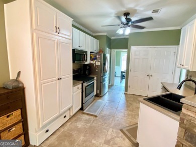 Welcome to 2156 Racoon Court, located in Mirror Lake, a 36 holes on Mirror Lake Golf Club in Georgia - for sale on GolfHomes.com, golf home, golf lot