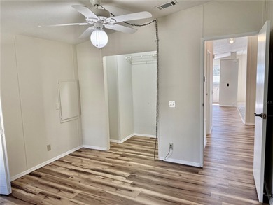 Move-in ready and beautifully refreshed, this 2-bedroom, 2-bath on Zellwood Station Country Club in Florida - for sale on GolfHomes.com, golf home, golf lot