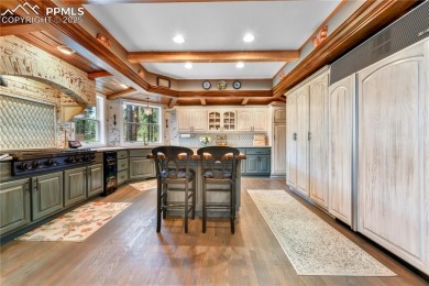 Prepare to be truly impressed--this extraordinary two-story home on Woodmoor Pines Country Club in Colorado - for sale on GolfHomes.com, golf home, golf lot