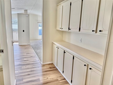 Move-in ready and beautifully refreshed, this 2-bedroom, 2-bath on Zellwood Station Country Club in Florida - for sale on GolfHomes.com, golf home, golf lot