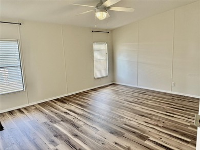 Move-in ready and beautifully refreshed, this 2-bedroom, 2-bath on Zellwood Station Country Club in Florida - for sale on GolfHomes.com, golf home, golf lot