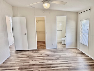 Move-in ready and beautifully refreshed, this 2-bedroom, 2-bath on Zellwood Station Country Club in Florida - for sale on GolfHomes.com, golf home, golf lot