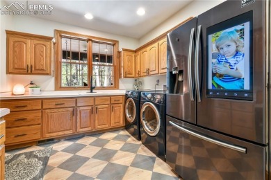 Prepare to be truly impressed--this extraordinary two-story home on Woodmoor Pines Country Club in Colorado - for sale on GolfHomes.com, golf home, golf lot