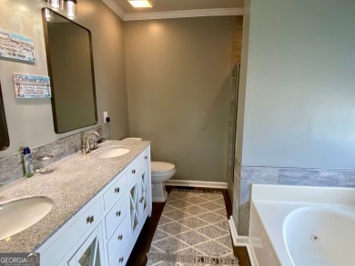 Welcome to 2156 Racoon Court, located in Mirror Lake, a 36 holes on Mirror Lake Golf Club in Georgia - for sale on GolfHomes.com, golf home, golf lot