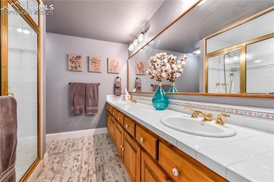 Prepare to be truly impressed--this extraordinary two-story home on Woodmoor Pines Country Club in Colorado - for sale on GolfHomes.com, golf home, golf lot