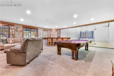 Prepare to be truly impressed--this extraordinary two-story home on Woodmoor Pines Country Club in Colorado - for sale on GolfHomes.com, golf home, golf lot