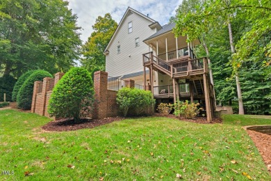 Welcome home to 102 Solitude Way, nestled on a serene 1.3-acre on Lochmere Golf Club in North Carolina - for sale on GolfHomes.com, golf home, golf lot