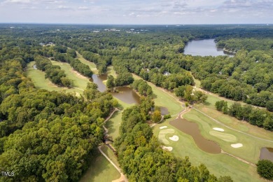 Welcome home to 102 Solitude Way, nestled on a serene 1.3-acre on Lochmere Golf Club in North Carolina - for sale on GolfHomes.com, golf home, golf lot