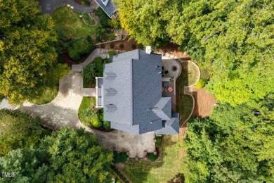 Welcome home to 102 Solitude Way, nestled on a serene 1.3-acre on Lochmere Golf Club in North Carolina - for sale on GolfHomes.com, golf home, golf lot