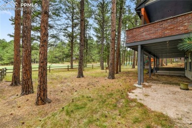 Prepare to be truly impressed--this extraordinary two-story home on Woodmoor Pines Country Club in Colorado - for sale on GolfHomes.com, golf home, golf lot