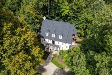 Welcome home to 102 Solitude Way, nestled on a serene 1.3-acre on Lochmere Golf Club in North Carolina - for sale on GolfHomes.com, golf home, golf lot