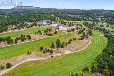 Prepare to be truly impressed--this extraordinary two-story home on Woodmoor Pines Country Club in Colorado - for sale on GolfHomes.com, golf home, golf lot