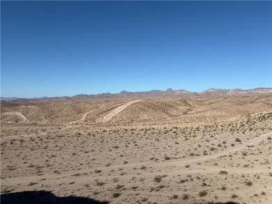BREATHTAKING VIEWS!! The highest point in Laughlin Ranch on Laughlin Ranch Golf Club in Arizona - for sale on GolfHomes.com, golf home, golf lot