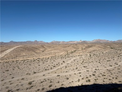 BREATHTAKING VIEWS!! The highest point in Laughlin Ranch on Laughlin Ranch Golf Club in Arizona - for sale on GolfHomes.com, golf home, golf lot