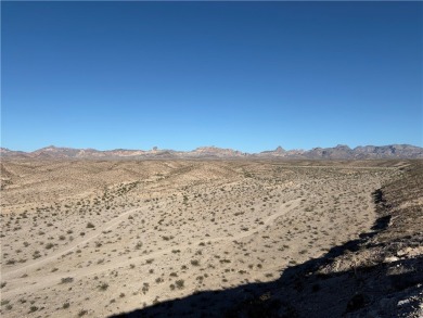 BREATHTAKING VIEWS!! The highest point in Laughlin Ranch on Laughlin Ranch Golf Club in Arizona - for sale on GolfHomes.com, golf home, golf lot