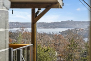 Situated on two massive water view lots in stunning & convenient on Kimberling City Golf Club in Missouri - for sale on GolfHomes.com, golf home, golf lot